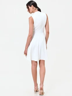 ABITO BIANCO CON REVERS E BOTTONE DESIGN