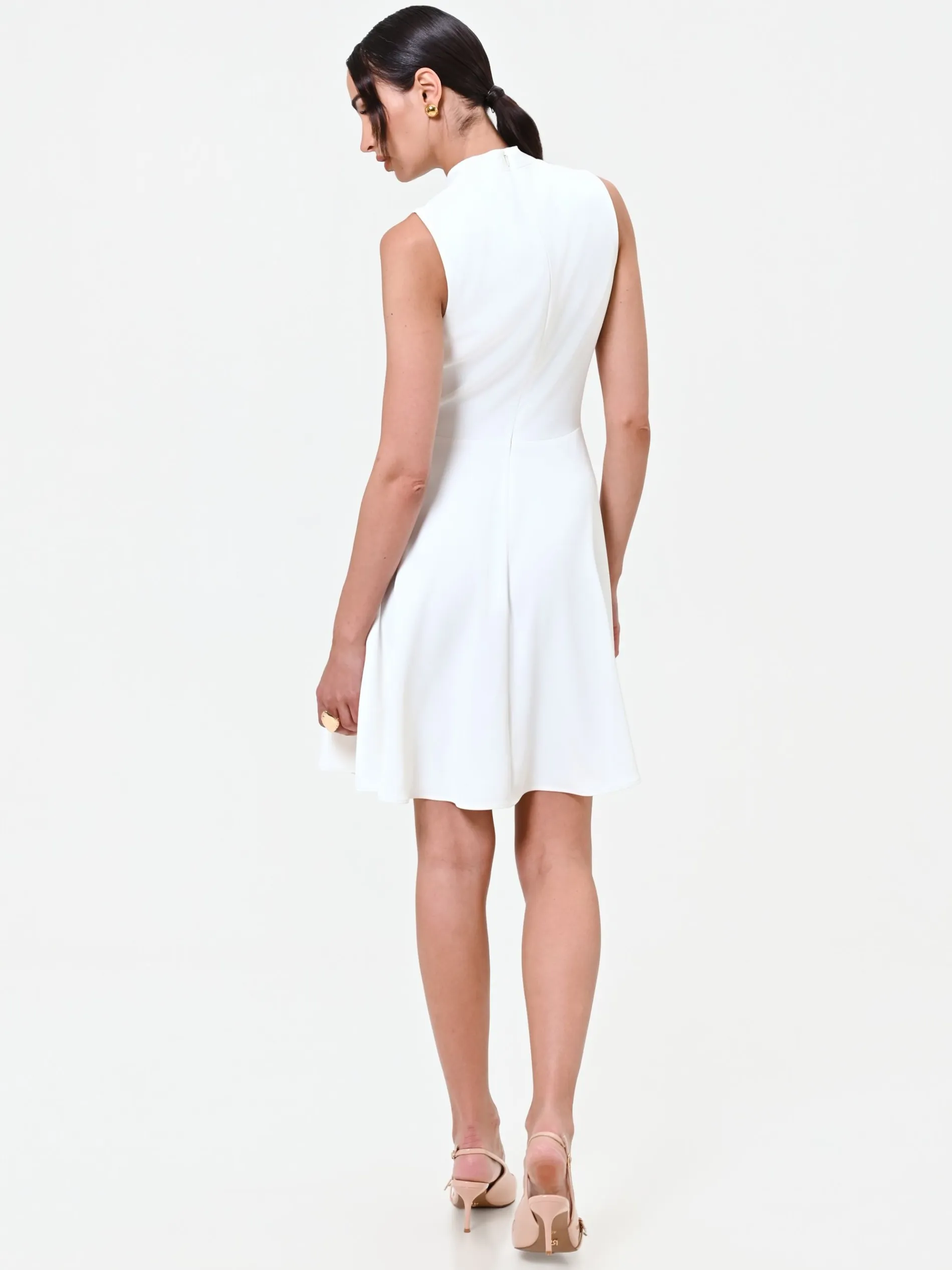 ABITO BIANCO CON REVERS E BOTTONE DESIGN