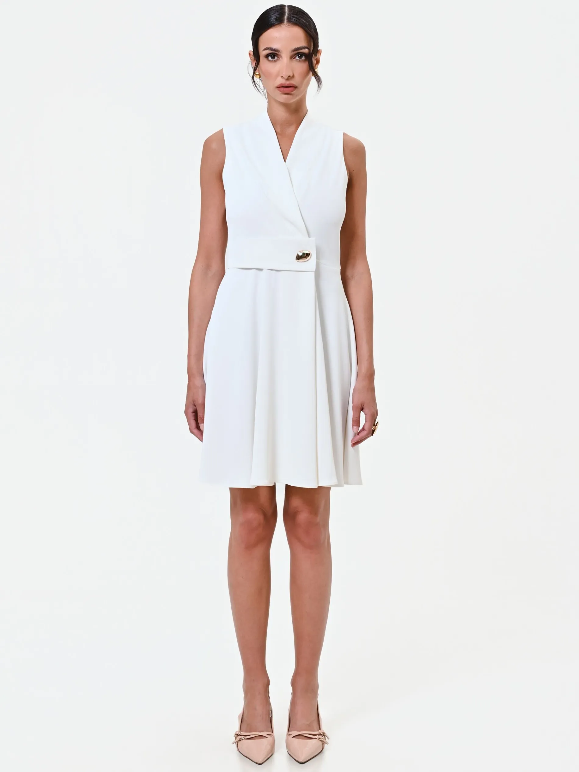 ABITO BIANCO CON REVERS E BOTTONE DESIGN