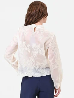 BLUSA IN PIZZO PANNA CON FIOCCO AL COLLO