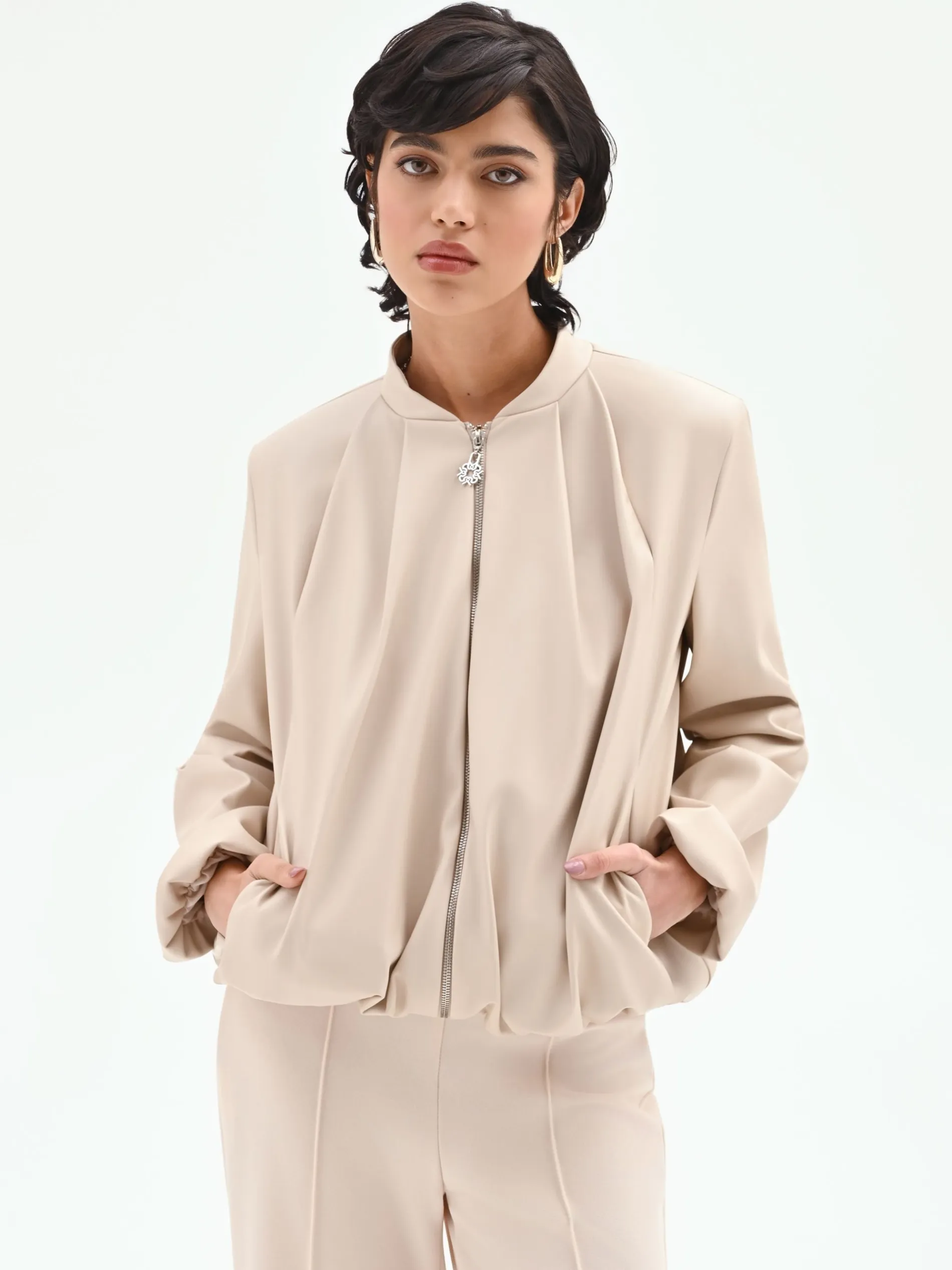 BOMBER IN SIMILPELLE TORTORA BEIGE CON MANICHE A PALLONCINO