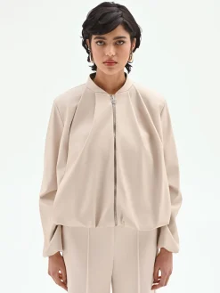 BOMBER IN SIMILPELLE TORTORA BEIGE CON MANICHE A PALLONCINO