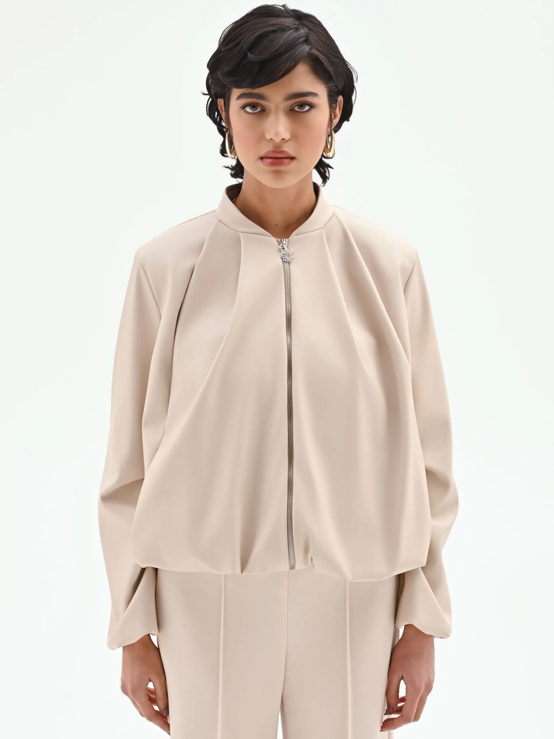 BOMBER IN SIMILPELLE TORTORA BEIGE CON MANICHE A PALLONCINO