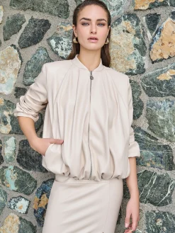 BOMBER IN SIMILPELLE TORTORA BEIGE CON MANICHE A PALLONCINO