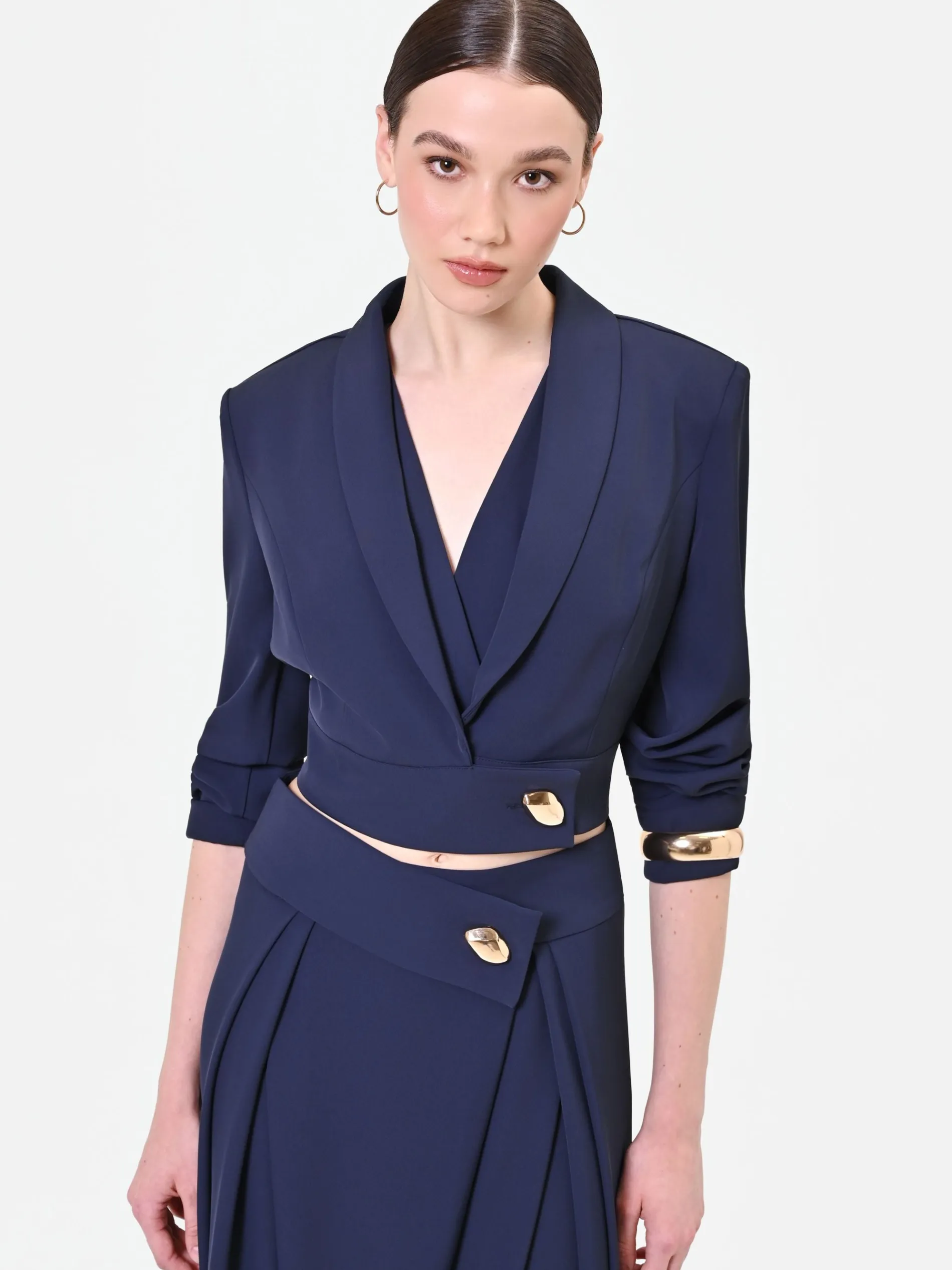 GIACCA CORTA BLU NAVY CON BOTTONE DESIGN