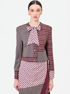 GIACCA ROSSO BORDEAUX CON DESIGN PATCHWORK E FIOCCO