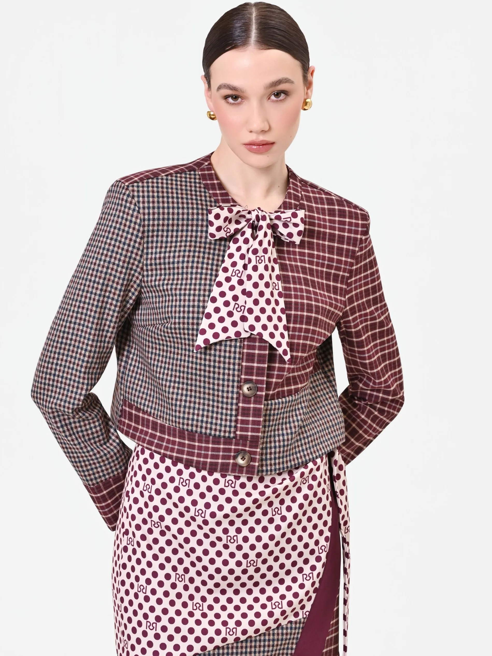 GIACCA ROSSO BORDEAUX CON DESIGN PATCHWORK E FIOCCO