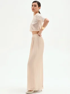 PANTALONE A PALAZZO BEIGE CHIARO IN RASO CANGIANTE