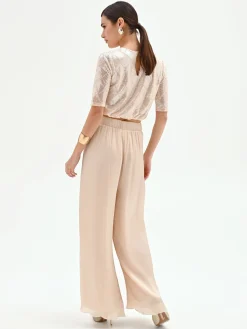 PANTALONE A PALAZZO BEIGE CHIARO IN RASO CANGIANTE