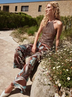 PANTALONE A PALAZZO CIOCCOLATO CON STAMPA BOTANICA