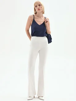 PANTALONE A ZAMPA BIANCO IN TESSUTO TECNICO