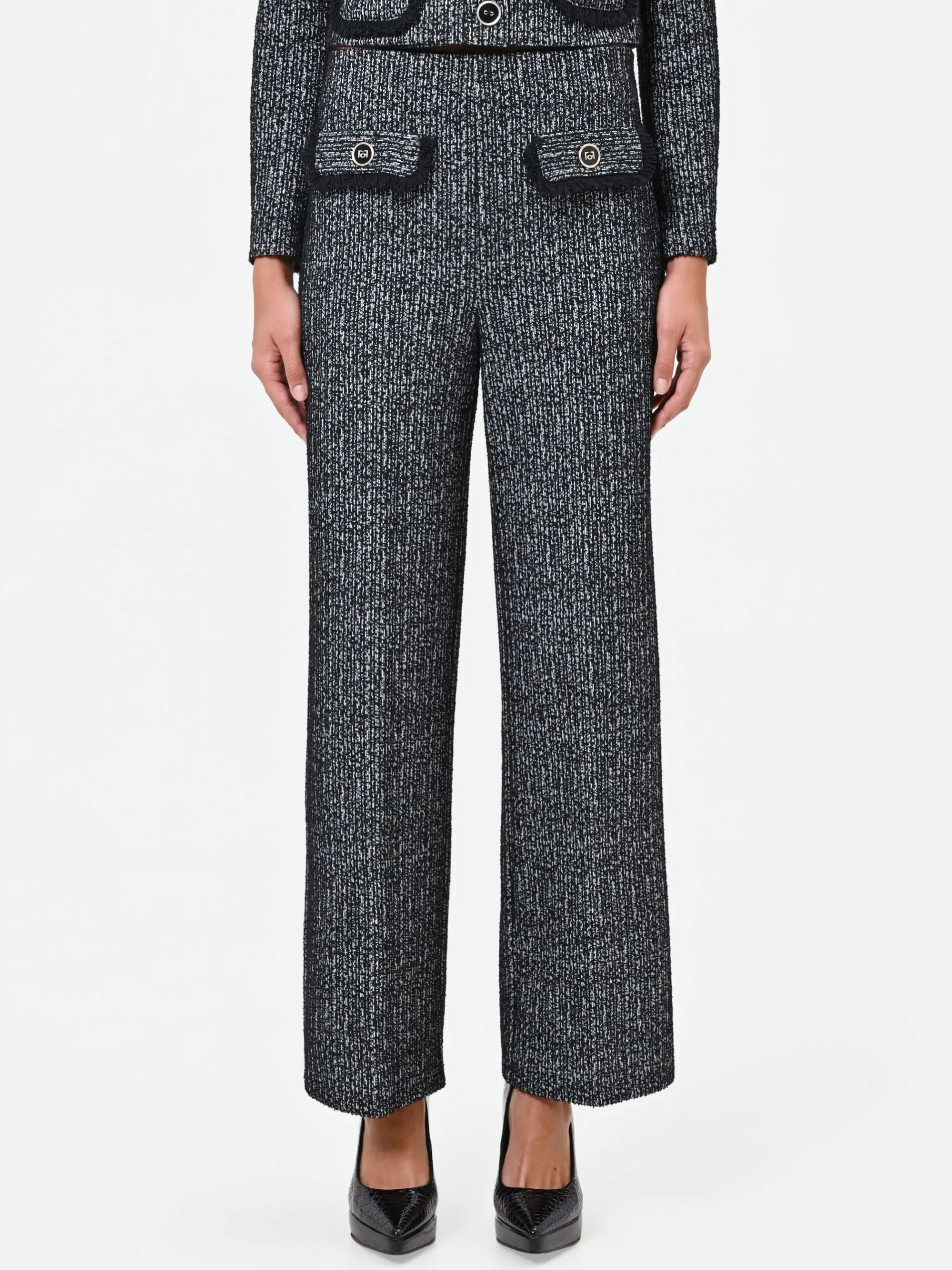 PANTALONE NERO IN BOUCLÉ CON TASCHE A TOPPA