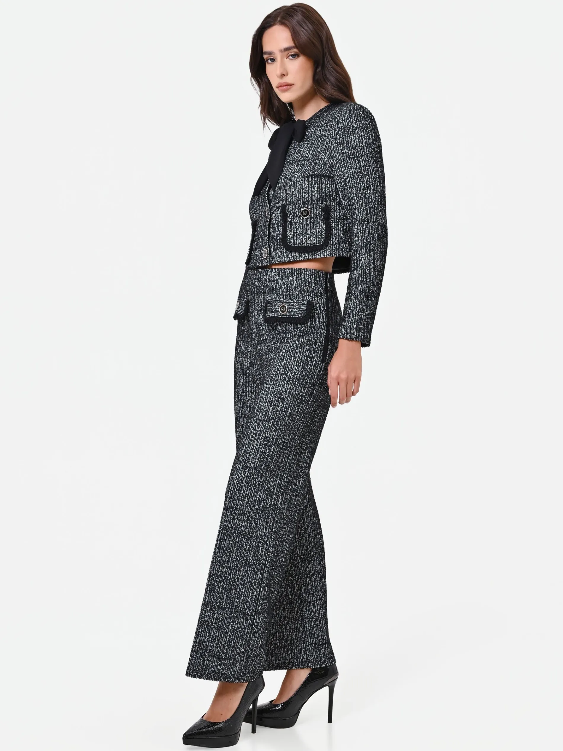 PANTALONE NERO IN BOUCLÉ CON TASCHE A TOPPA