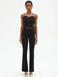 PANTALONE NERO SVASATO IN TESSUTO TECNICO