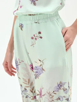 PANTALONE PALAZZO VERDE MENTA IN RASO CON STAMPA BOTANICA