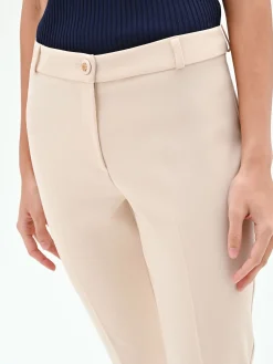 PANTALONE SKINNY BEIGE CHIARO IN TESSUTO TECNICO