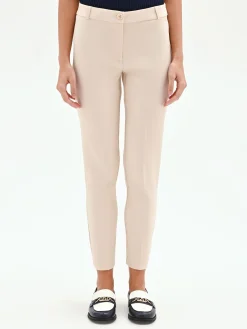 PANTALONE SKINNY BEIGE CHIARO IN TESSUTO TECNICO
