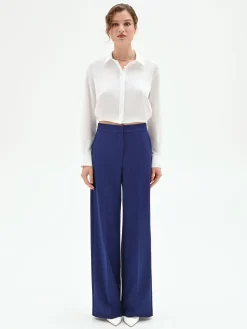 PANTALONE STUDIO A PALAZZO IN TESSUTO TECNICO BLU INDACO