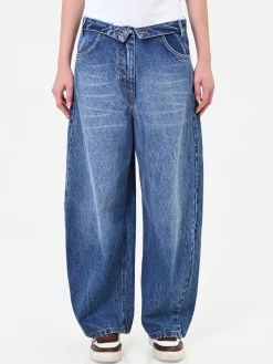 PANTALONI JEANS BLU INDACO CON CHIUSURA ASIMMETRICA
