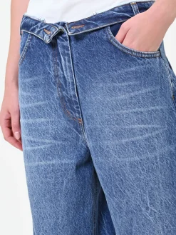 PANTALONI JEANS BLU INDACO CON CHIUSURA ASIMMETRICA