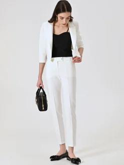PANTALONI SLIM IN TESSUTO TECNICO BIANCO