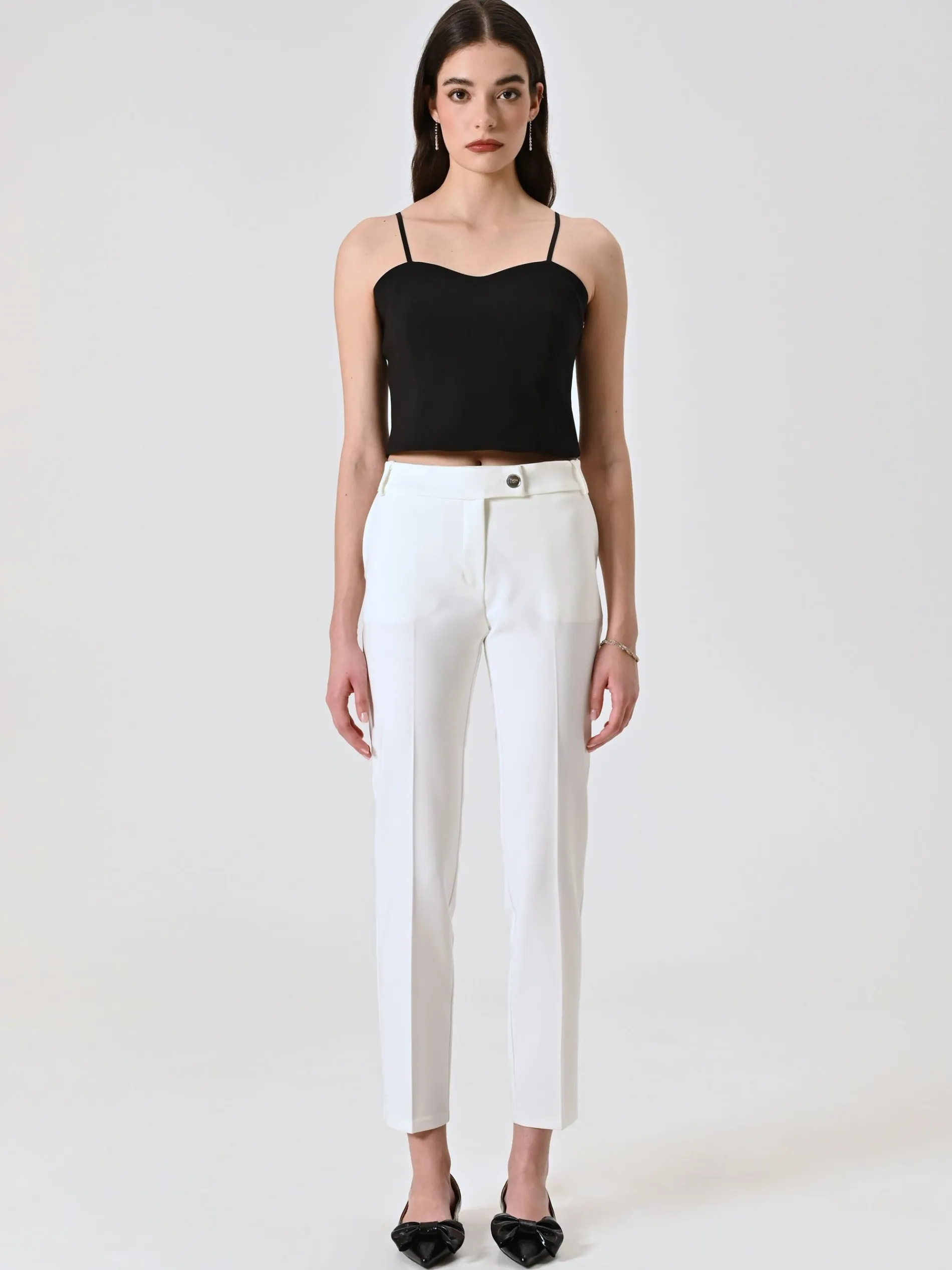 PANTALONI SLIM IN TESSUTO TECNICO BIANCO