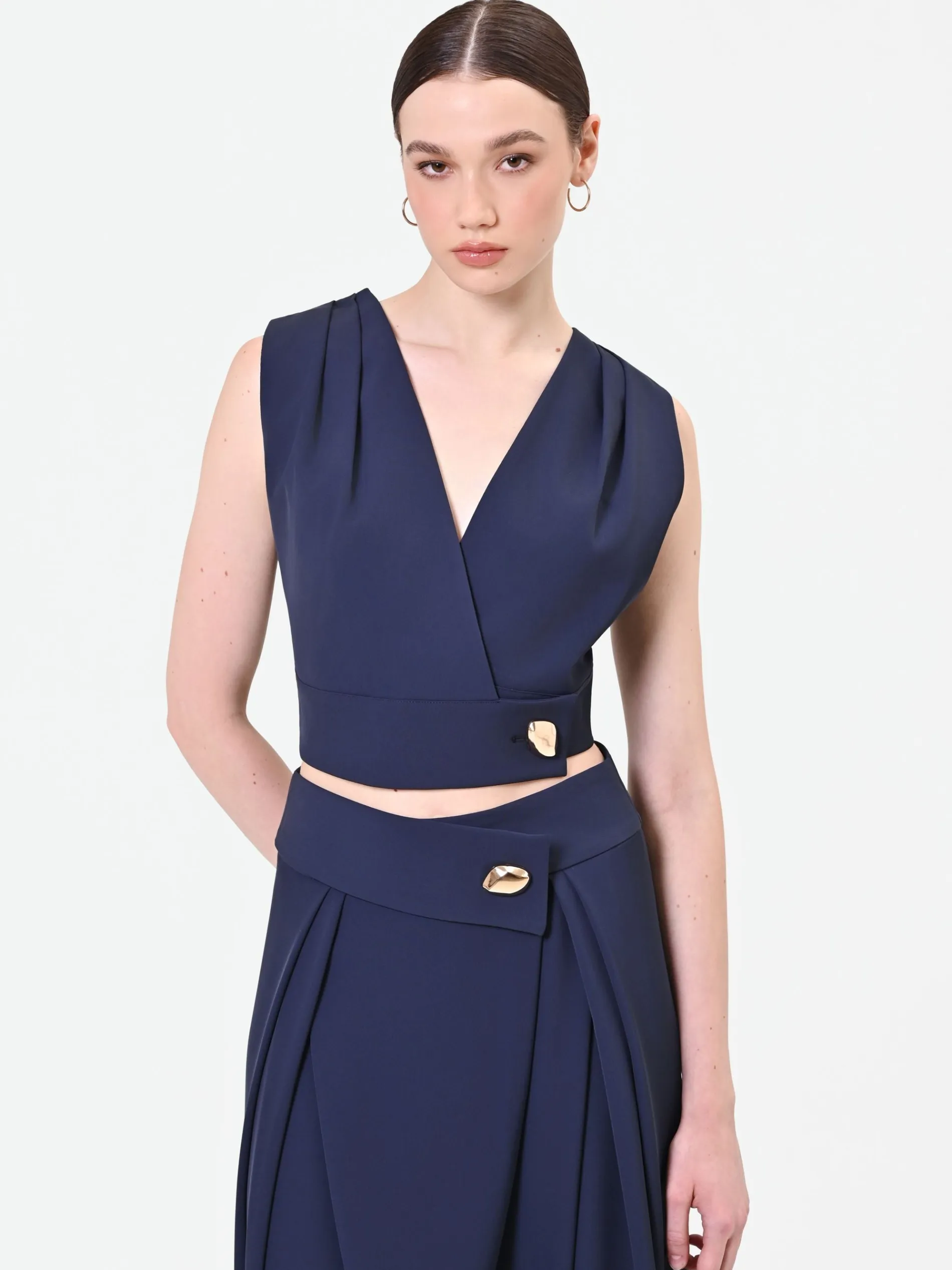 TOP BLU NAVY CON INCROCIO E BOTTONE DESIGN